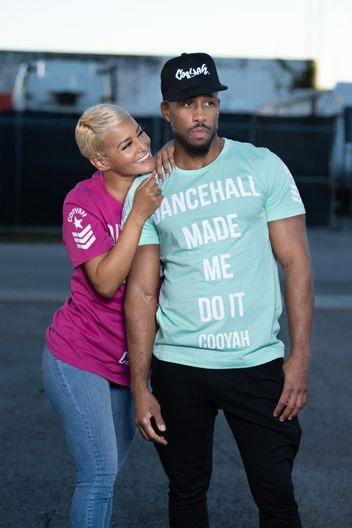 Cooyah Jamaica - Men's and Women's Dancehall Made Me Do It graphic tees in mint green and berry.  As a Jamaican owned clothing brand since 1987, we take pride in bringing you this classic piece. Don't wait, get yours now!