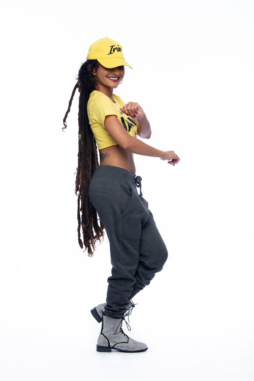 Cooyah - women's yellow made in Jamaica crop tops.  As a Jamaican owned clothing brand since 1987, we take pride in bringing you this classic tee shirt.
