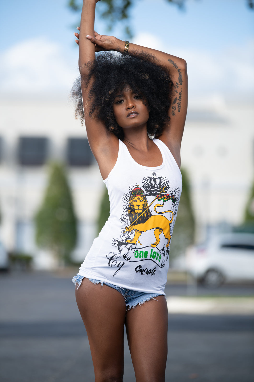Cooyah Clothing.  Women's Lion Crown One Love tank top.  White with rasta colors.  IRIE