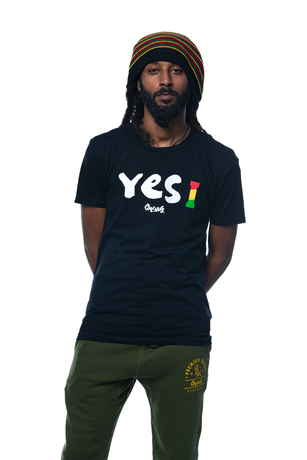 Cooyah Jamaica. Men's short sleeve tee with Yes I graphic. Black t-shirt screen printed in rasta colors. Reggae style. Jamaican clothing band. IRIE
