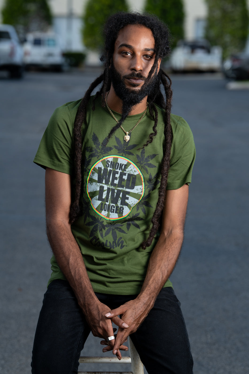 Cooyah Jamaica. Smoke Weed Live Longer Tee. Cannabis, Kush screen printed graphic tee in olive green. Men's short sleeve ringspun cotton t-shirt. Jamaican clothing brand.