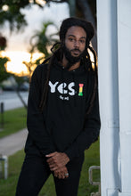 Load image into Gallery viewer, Cooyah Clothing. Men&#39;s Yes I Jamaica hoodie in black. Screen printed design in reggae colors. Jamaican streetwear clothing. IRIE
