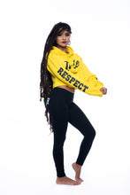 Load image into Gallery viewer, Cooyah Jamaica. Women&#39;s yellow cropped pull-over hoodie with irie graphic. Hand-printed Jamaican streetwear designs on the front, back, and sleeve for added style.
