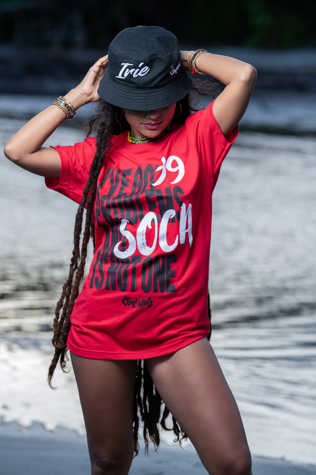 Cooyah Jamaica. I've Got 99 Problems and Soca is Not One. Women's Ringspun cotton, short sleeve graphic tee in red. Jamaican clothing brand.