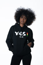 Load image into Gallery viewer, Cooyah Clothing. Women&#39;s Yes I Jamaica hoodie in black. Screen printed design in reggae colors. Jamaican streetwear clothing. IRIE
