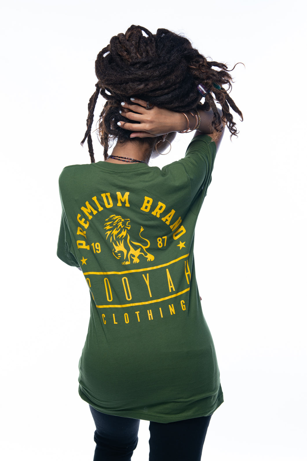 Cooyah Jamaica.  Women's boyfriend fit Premium Brand Lion Print Tee.  Olive green with a gold print.  Ringspun cotton, short sleeve, shirt.  Jamaican clothing brand.