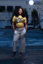 Load image into Gallery viewer, Cooyah women&#39;s Can&#39;t Stop, Won&#39;t Stop statement tee in yellow.  Screen printed on soft, ringspun cotton with a relaxed fit.
