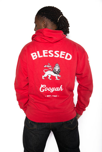 Cooyah Jamaica.  Men's hoodie with Blessed Rasta Lion graphic in red.  We are a Jamaican owned clothing company since 1987.  IRIE