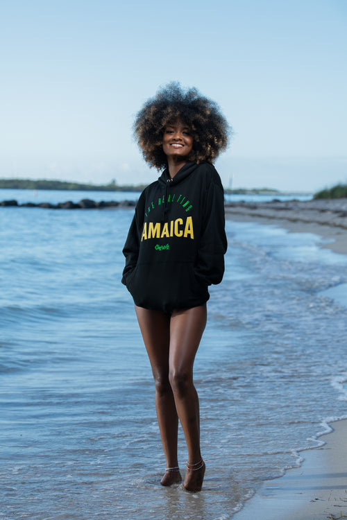 Cooyah - Women's Real Ting Jamaica  Pullover Hoodie - screen printed in Jamaican colors.  This top features soft fabric, a front kangaroo pocket, and matching drawstrings. 