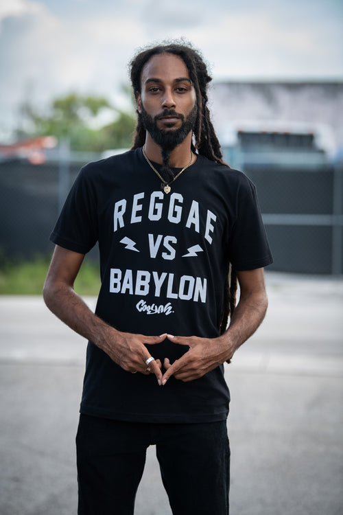 Cooyah Jamaica.  Men's short sleeve Reggae VS Babylon graphic tee in black.  Ringspun, crew neck shirt.  Jamaican streetwear clothing. IRIE
