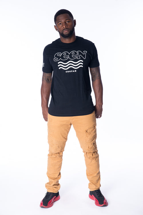 Cooyah Jamaica - Men's Seen graphic tee.  Screen printed on soft, 100% ringspun cotton.  We are a Jamaican owned clothing brand established in 1987.