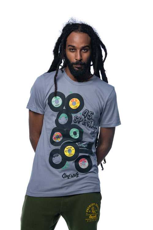 Cooyah Jamaica. Men 's short sleeve graphic tee with 45 RPM Vinyl records screen printed on the front. Vintage reggae and rocksteady style. Gray Shirt, short sleeve, ringspun cotton. Jamaican streetwear clothing brand. IRIE